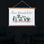 Modern love quote plants watercolor illustration hanging tapestry<br><div class="desc">A cool and modern love quote house plants watercolor illustration with different painted plants on a shelf,  cactus,  monstera,  and other succulents. A tropical and exotic touch with an editable quote saying love grows here in an elegant and modern script calligraphy.</div>