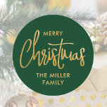 Modern Merry Christmas Custom Name Green Gold Classic Round Sticker<br><div class="desc">Create your own holiday stickers with this simple and elegant design. These circle-shaped stickers display the words 'Merry Christmas' and can be personalized with a name, your family name or the holiday year. A modern and chic template, featuring stylish script lettering with a textured faux gold effect, against a forest...</div>
