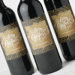 Modern Merry Christmas on Gold Black Wine Label<br><div class="desc">Elegant Merry Christmas typography in chic white lettering on a splash of faux gold foil,  these wine bottle labels feature a black background with modern gold squiggles and dots pattern. Personalized with your name. MATCHING paper plates,  napkins and MORE designs in our store.</div>