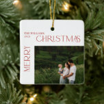Modern Merry Christmas Red Berry Botanical Photo Ceramic Ornament<br><div class="desc">Make the holiday season extra special with this Modern Merry Christmas Red Berry Botanical 2 Photo Ceramic Ornament! This unique ornament features a modern ligature typography that reads “Merry Christmas” and on the back is a beautiful, matching botanical pattern. Add a personal touch by customising it with your family name...</div>