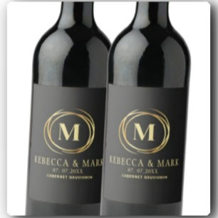 Modern metallic gold circle shape faux monogram wine label