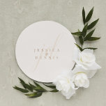 Modern Minimal Elegant Script Monogram Wedding Classic Round Sticker<br><div class="desc">Modern Minimal Elegant Script Monogram Wedding Classic Round Sticker Add a touch of elegance to your wedding with these modern, minimalist, and elegant script monogram classic round stickers. Crafted in classic boho (white linen) and Muesli colours, these stickers are perfect for sealing invitations, favour bags, or adding a personalized touch...</div>