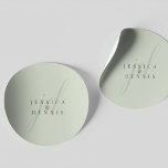 Modern Minimal Elegant Script Monogram Wedding Classic Round Sticker<br><div class="desc">Modern Minimal Elegant Script Monogram Wedding Classic Round Sticker Add a touch of elegance to your wedding with these modern, minimalist, and elegant script monogram classic round stickers. Crafted in classic sage green and dark brown colours, these stickers are perfect for sealing invitations, favour bags, or adding a personalized touch...</div>