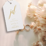 Modern Minimal Elegant Script Monogram Wedding Gift Tags<br><div class="desc">Modern Minimal Elegant Calligraphy Script Monogram Wedding Gift Tags Add a touch of elegance to your wedding favours with these stunning, modern, minimalist, and elegant calligraphy script monogram gift tags. Crafted in classic white and gold, these tags are the perfect way to personalize your gifts and thank your guests. The...</div>
