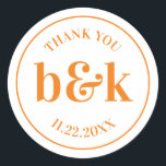 Modern Minimal Monogram Initials Orange Wedding Cl Classic Round Sticker<br><div class="desc">Modern,  minimal,  minimalist wedding design with big bold letters in orange tone colour (colour,  font,  text,  size can be changed).  Thank you  with date and bride and groom monograms (initials).  Perfect for that young couple; fall/autumn wedding.</div>