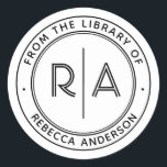 Modern Minimal Monogram The Library of Bookplate Classic Round Sticker<br><div class="desc">Enhance your personal library with our elegant and minimal "From the Library of" or "This Book Belongs To" bookplate. Featuring your monogram initials in a modern open type separated by a sleek vertical line, this custom bookplate also includes your name and personalized text in a modern sans-serif font. Perfect for...</div>