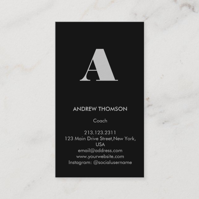 Modern Minimal Solid Black Monogram Vertical Business Card (Front)
