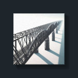 Modern Minimalist Architectural Bridge - Infinite  Canvas Print<br><div class="desc">A stunning digital artwork featuring a massive steel truss bridge stretching into an infinite, misty horizon. The composition utilizes a powerful diagonal perspective, showcasing the intricate geometric patterns of the industrial ironwork against a clean, minimalist background. Ideal for modern office spaces, industrial-themed interiors, or anyone who appreciates architectural precision and...</div>