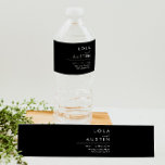 Modern Minimalist | Black Water Bottle Label<br><div class="desc">This modern minimalist | black water bottle label is perfect for your classy boho wedding. Its simple, unique abstract design accompanied by a contemporary minimal script and a black and white colour palette gives this product a feel of elegant formal luxury while staying simplistic, chic bohemian. Keep it as is,...</div>