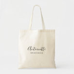 Modern Minimalist Bridesmaid Custom Name Tote Bag<br><div class="desc">This Bridesmaid custom design features a handwritten script typography. You can easily personalize with a name and title or add your custom message! The perfect elegant accessory for a bridesmaid or bachelorette goodie bag! Debra Valencia, a visionary surface pattern artist, product designer and entrepreneur with a passion for world travel,...</div>