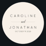 Modern Minimalist Custom Wedding Names Ivory Classic Round Sticker<br><div class="desc">Add a refined touch to your wedding favours, envelopes, or decor with these elegant minimalist personalized wedding stickers. Featuring modern typography and a clean, sophisticated design, these custom stickers are perfect for sealing invitations, favour packaging, or thank-you gifts. Personalize them with your names and wedding date for a timeless keepsake....</div>