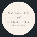 Modern Minimalist Custom Wedding Names Ivory Classic Round Sticker<br><div class="desc">Add a refined touch to your wedding favours, envelopes, or decor with these elegant minimalist personalized wedding stickers. Featuring modern typography and a clean, sophisticated design, these custom stickers are perfect for sealing invitations, favour packaging, or thank-you gifts. Personalize them with your names and wedding date for a timeless keepsake....</div>