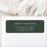 Modern Minimalist Green Typewriter Merry Christmas<br><div class="desc">Give your holiday mail a polished, personal touch with this Modern Minimalist Holiday Address Label. With its minimalist green design and trendy typewriter-inspired font, this label offers a contemporary way to customize your holiday envelopes. Add your address for a clean, stylish look that pairs perfectly with the rest of your...</div>