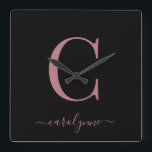 Modern Minimalist Rose Gold Monogram Script Name Square Wall Clock<br><div class="desc">Chic Elegant Pink Rose Gold Monogram Script on a chic Black Wall Clock. Easy to customize with your own name and details. Perfect for your luxury lifestyle! Please contact us at cedarandstring@gmail.com if you need assistance with the design or matching products.</div>