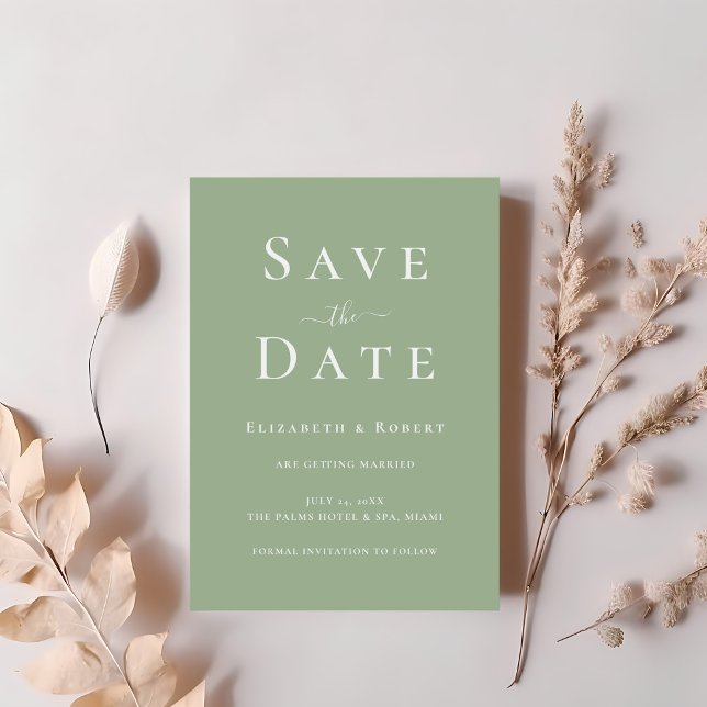 Modern Minimalist Sage Green Save the Date Invitation (Modern Minimalist Sage Green Save the Date Invitation on a table with blush pink flowers.)