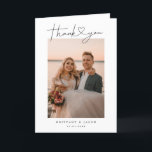 Modern Minimalist Script Heart Wedding Photo Thank You Card<br><div class="desc">Elegant and simple wedding thank you folded greeting card featuring a hand lettered typography script text with a heart between the words. This casual script and the white space gives a simple and minimalistic feel. Customize this product by inserting your own vertical wedding photos and editing the message inside the...</div>