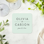 Modern Mint and Black Wedding Monogram Square Paper Coaster<br><div class="desc">Modern and chic mint blue green wedding coasters feature an elegant and minimal black typographic monogram design that can be personalized with the bride and groom names and wedding date.</div>