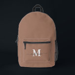 Modern Mocha Mousse Custom Monogram Name Printed Backpack<br><div class="desc">Elevate your everyday style with this Modern Mocha Mousse Custom Monogram Name Printed Backpack. Designed in Mocha Mousse, the colour of the year, this backpack blends sophisticated minimalism with personalized elegance. The sleek, neutral tone makes it versatile and timeless, while the option to add your custom monogram or name adds...</div>