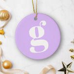 Modern Monogram Initial Letter Pastel Lavender Ceramic Ornament<br><div class="desc">Add a touch of modern elegance to your holiday décor with this monogram ceramic ornament in soft pastel lavender. Featuring a bold initial letter in sleek typography, it’s the perfect minimalist accent for your tree or as a year-round keepsake. The gentle lavender hue gives it a calming, contemporary feel that...</div>