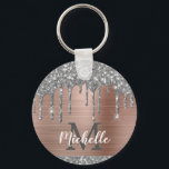 Modern Monogrammed Silver Glitter Drips Pink Metal Keychain<br><div class="desc">Modern, girly silver grey glitter drips name and monogrammed keychain.This design features silver grey (grey) glitter sparkle drips on pink rose gold brushed metal background with custom personalized monogram initial and first name text template. Perfect feminine gift. Please note, this design is printed photo effect. If you need help or...</div>