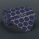 Modern Navy Blue Gold Foil Geometric Monogram Tie<br><div class="desc">Modern Navy Blue Gold Foil Geometric Monogram Necktie in a stylish pattern of stylish gold hexagons on an elegant navy blue background. Easy to customize with text, fonts, and colours. Created by Zazzle pro designer BK Thompson © exclusively for Cedar and String; please contact us at cedarandstring@gmail.com if you need...</div>