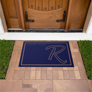 Modern Navy Blue Gold Monogram Script Family Name Doormat