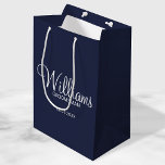 Modern Navy Blue  Personalized Groomsman Medium Gift Bag<br><div class="desc">Personalized Groomsman Gifts
featuring personalized groomsman's name in white modern script font style with title and wedding date in modern sans serif font style on navy blue background.

Also perfect for best man,  father of the bride,  bridesmaid,  maid of honour,  mother of the bride and more.</div>