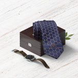 Modern Navy Blue Rose Gold Foil Geometric Monogram Tie<br><div class="desc">Modern Navy Blue Rose Gold Foil Geometric Monogram Necktie in a stylish pattern of copper rose gold hexagons on an elegant navy blue background. Easy to customize with text, fonts, and colors. Created by Zazzle pro designer BK Thompson © exclusively for Cedar and String; please contact us if you need...</div>