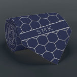 Modern Navy Blue Silver Foil Geometric Monogram Tie<br><div class="desc">Modern Navy Silver Foil Geometric Monogram Necktie in a stylish pattern of silvery grey hexagons on an elegant navy blue background. Easy to customize with text, fonts, and colours. Created by Zazzle pro designer BK Thompson © exclusively for Cedar and String; please contact us at cedarandstring@gmail.com if you need assistance,...</div>