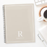 Modern Neutral Cream Beige Family Name Planner<br><div class="desc">Custom-designed planner notebook featuring classic modern family name monogram design on neutral earthy colour background.</div>