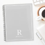 Modern Neutral Grey Family Name Planner<br><div class="desc">Custom-designed planner notebook featuring classic modern family name monogram design on neutral earthy colour background.</div>