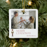 Modern Nutcracker Merry Christmas 2 Photo Family  Ceramic Ornament<br><div class="desc">This Modern Nutcracker Merry Christmas 2 Photo Family Ceramic Ornament is the perfect way to commemorate this holiday season with your family. With festive ‘Merry Christmas’ typography in red and a watercolor nutcracker adorning the front, your families name will stand out this Holiday season. Personalize your ornament with two of...</div>