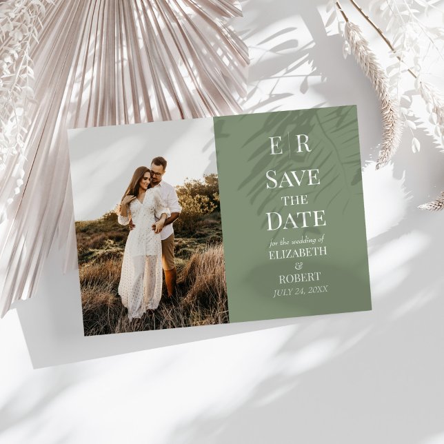 Modern Olive Monogram Photo Save the Date Card (Modern Olive Monogram Photo Save the Date Card on a sunny white table with neutral dry botanicals.)