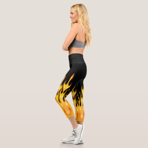 Modern orange yellow fire flames on black capri leggings