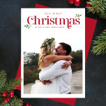 Modern Our First Christmas Newlywed Photo Holiday Card<br><div class="desc">The Modern Our First Christmas Newlywed Photo Holiday Card combines elegant typography with a modern design, beautifully showcasing your favourite photos to celebrate your first Christmas as newlyweds. With festive red accents, this card is the perfect way to share the joy of your newly married life—easily customizable to fit your...</div>