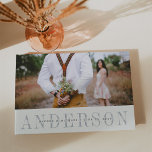 Modern Overlay Wedding Guest Book<br><div class="desc">Invite your wedding guests to share their wishes and wisdom with this chic guest book, featuring your favourite engagement photo or casual snapshot on the front. Your surname appears beneath in elegant grey lettering, with an overlay of your first names and wedding date. Complete the look with an additional full...</div>