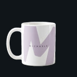 Modern Oversized Monogrammed Initial & Name Coffee Mug<br><div class="desc">Add a touch of softness and style to your daily routine with this personalized lavender monogram mug. Featuring a large, abstract initial in a muted lavender shade and a modern sans-serif name overlay, this mug is designed to stand out with understated elegance. The contemporary design is perfect for those who...</div>