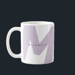 Modern Oversized Monogrammed Initial & Name Coffee Mug<br><div class="desc">Add a touch of softness and style to your daily routine with this personalized lavender monogram mug. Featuring a large, abstract initial in a muted lavender shade and a modern sans-serif name overlay, this mug is designed to stand out with understated elegance. The contemporary design is perfect for those who...</div>