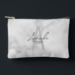 Modern Personalized Bridesmaid's Monogram and Name Accessory Pouch<br><div class="desc">Modern Personalized Bridesmaid's Monogram and Name Gifts This design features personalized bridesmaid's name in grey modern handwriting script font style and monogram in light grey modern sans serif font style as background, with wedding details in grey modern sans serif font style, on white marble background. Also perfect for maid of...</div>