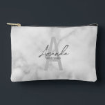 Modern Personalized Bridesmaid's Monogram and Name Accessory Pouch<br><div class="desc">Modern Personalized Bridesmaid's Monogram and Name Gifts This design features personalized bridesmaid's name in grey modern handwriting script font style and monogram in light grey modern sans serif font style as background, with wedding details in grey modern sans serif font style, on white marble background. Also perfect for maid of...</div>