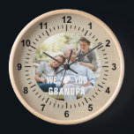 Modern Photo Grandpa Script Heart Clock<br><div class="desc">Modern Photo Grandpa Script Heart Wall Clock features your favourite photo with the text "We (heart) you Grandpa" in a modern white typography overlay. Personalize by editing the text in the text box provided. Designed by ©Evco Studio www.zazzle.com/store/evcostudio</div>