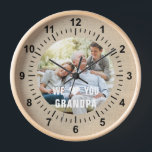 Modern Photo Grandpa Script Heart Clock<br><div class="desc">Modern Photo Grandpa Script Heart Wall Clock features your favourite photo with the text "We (heart) you Grandpa" in a modern white typography overlay. Personalize by editing the text in the text box provided. Designed by ©Evco Studio www.zazzle.com/store/evcostudio</div>