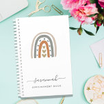 Modern rainbow rose gold gray white monogram 2025 planner<br><div class="desc">Decorated with a modern abstract, minimalist painted large rainbow with hearts in gray and dark rose gold. A chic white background. The modern symbol of hope. Personalize and add your name and a year in gray. The name is written with a trendy hand lettered style script with swashes. To keep...</div>