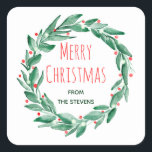 Modern red green watercolor Merry Christmas wreath Square Sticker<br><div class="desc">Modern red green watercolor Merry Christmas wreath featuring a painted greenery foliage and branches with red mistletoe and white holly berries.</div>