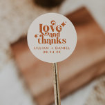 Modern Retro Cream and Orange Wedding Thank You  Classic Round Sticker<br><div class="desc">This Modern Retro Cream and Orange Wedding Thank You Classic Round Sticker is a great way to add a little more personalization to your big day. The colour palette of orange and cream gives this an extra modern,  yet vintage retro look. Say thank you with Love & Thanks.</div>