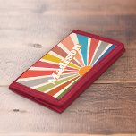 Modern Retro Custom Name Fun Vintage Rainbow Trifold Wallet<br><div class="desc">Introducing the Custom Name wallet with a Modern Retro Fun Vintage Rainbow Sun Burst Illustration. This wallet is a unique and personalized piece that features a vibrant and colourful sunburst design, reminiscent of the retro aesthetic of the 60s and 70s. The groovy rainbow-coloured sunburst illustration on this wallet is eye-catching...</div>