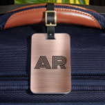 Modern Rose Gold Metal Two Monogram Initial Luggage Tag<br><div class="desc">Elegant Girly Stylish Modern Rose Gold Metal Two Monogram Initial Custom Personalized Personalized Luggage Bag Tag. This design featuring two (2) bold monogram initial typography font and the reverse side address info on Rose Gold Brushed metal (Rose gold metallic foil look) background. These are easy to customize it. Stylish gift...</div>