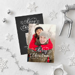 Modern Script Black White Merry Christmas Photo Holiday Card<br><div class="desc">Personalize these modern Merry Christmas in script writing holiday photo greeting cards with two photos (front and back of card) and custom text. The black background colour and textured design layer on the back can be modified or removed.</div>