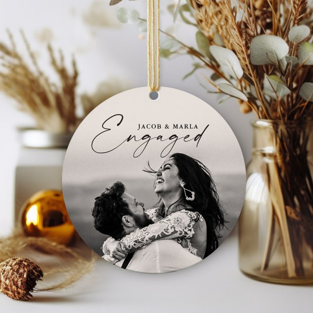 Modern Script Engaged 2 Photo Wedding Engagement Ceramic Ornament (Elegant script engaged 2 photo wedding engagement christmas holiday ornament.)