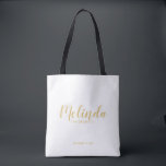 Modern Script Gold Personalized Bridesmaids Tote Bag<br><div class="desc">Modern Script Gold Personalized Bridesmaids Tote Bag featuring personalized bridesmaid's name in gold modern calligraphy font style with title and wedding date in modern sans serif font style on white background. Also perfect for Maid of Honour, Flower Girl, Mother of the Bride and more. Please Note: The foil details are...</div>